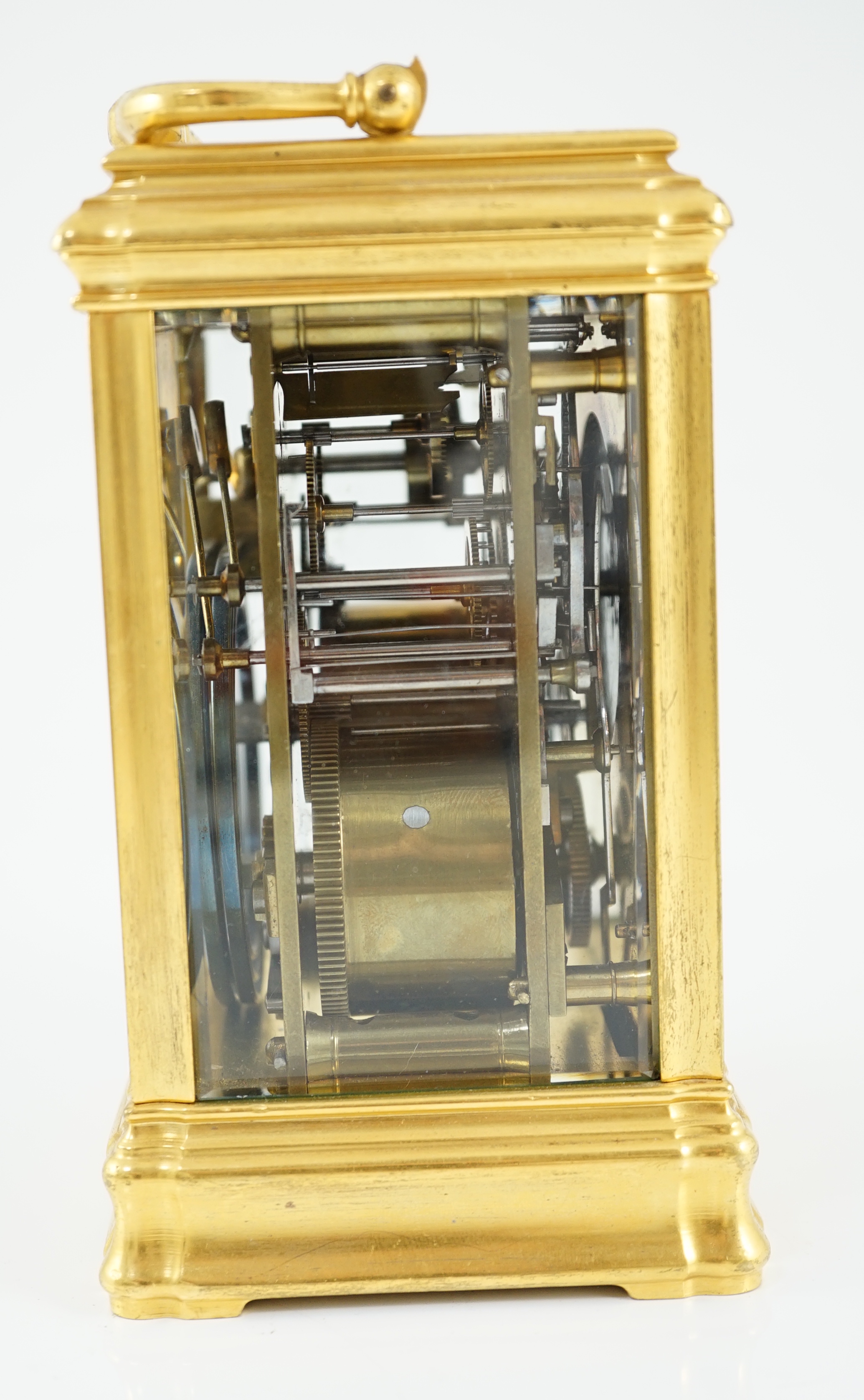 An early 20th century French ormolu Grande Sonnerie alarum clock, with enamelled Arabic dials and gorge case, movement striking on two blued steel gongs, 10cm wide, 9cm deep, 15.5cm high